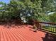 Expansive deck overlooking a serene lake, ideal for enjoying scenic views and peaceful moments at 7970 Cobblesprings Dr, Avon, IN 46123