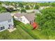 Home with a beautiful backyard, featuring a spacious lawn, patio, and a charming red deck at 7970 Cobblesprings Dr, Avon, IN 46123