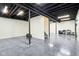 Spacious basement with finished floors and ceiling, offering potential for a home gym or recreational space at 7970 Cobblesprings Dr, Avon, IN 46123