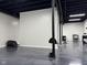 Spacious basement with dark flooring, black ceiling, and gym equipment at 7970 Cobblesprings Dr, Avon, IN 46123