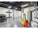Finished basement featuring exposed ceiling, offering versatility for a workshop or additional storage at 7970 Cobblesprings Dr, Avon, IN 46123