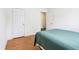 Bedroom featuring hardwood floors, neutral paint, and bright lighting at 7970 Cobblesprings Dr, Avon, IN 46123