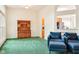 Comfortable bonus room offers nice views of the kitchen and deck at 7970 Cobblesprings Dr, Avon, IN 46123