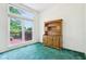 Bright bonus room with large window looking out to the deck at 7970 Cobblesprings Dr, Avon, IN 46123