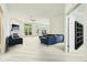 Bright living room featuring a fireplace, large windows and comfortable, modern furniture at 7970 Cobblesprings Dr, Avon, IN 46123