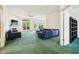 Bright living room boasts ample space and natural light from the deck at 7970 Cobblesprings Dr, Avon, IN 46123
