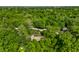 Beautiful aerial view of property surrounded by lush trees creating a private and serene environment at 8209 Beech Knoll, Indianapolis, IN 46256