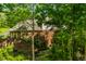 Beautiful brick exterior with a well-manicured landscape providing an inviting and elegant look at 8209 Beech Knoll, Indianapolis, IN 46256