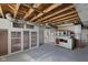 Basement features storage cabinets and a utility sink with ample workspace at 909 E Markwood Ave, Indianapolis, IN 46227