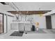 Basement area with exposed joists containing a washer and dryer hookup at 909 E Markwood Ave, Indianapolis, IN 46227