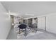 Bright basement with two camping chairs on a geometric rug at 909 E Markwood Ave, Indianapolis, IN 46227