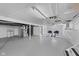 Bright basement with two camp chairs, furnace and utility sink at 909 E Markwood Ave, Indianapolis, IN 46227