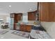 Modern kitchen featuring stainless steel appliances, granite countertops, and ample storage space at 909 E Markwood Ave, Indianapolis, IN 46227