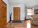 Warm and inviting entryway featuring hardwood floors and ample natural light with fresh paint at 9159 E County Road 400 N, Brownsburg, IN 46112