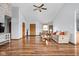 Spacious living room with beautiful hardwood floors, neutral paint, and cozy furniture at 9159 E County Road 400 N, Brownsburg, IN 46112