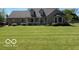 Charming single-Gathering home boasting a meticulously maintained lawn and inviting front porch at 916 N County Road 500 E, Avon, IN 46123
