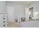Bedroom featuring a desk, dresser, closet, and view to hallway at 9598 N Mariners Crst, McCordsville, IN 46055
