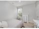 Bedroom with a bed, window, desk, and dresser at 9598 N Mariners Crst, McCordsville, IN 46055