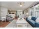 Bright living room boasts hardwood floors, open layout and neutral paint at 9598 N Mariners Crst, McCordsville, IN 46055