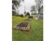 A backyard with green grass and three raised garden beds ready for planting at 1011 N 10Th St, Elwood, IN 46036