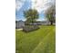 Spacious backyard with a shed, garden plot, and mature trees offers outdoor living at 1011 N 10Th St, Elwood, IN 46036