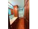 Cozy bathroom with wood cabinets, sink and tiled floor at 1011 N 10Th St, Elwood, IN 46036