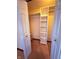 Walk-in closet features multiple storage solutions at 1011 N 10Th St, Elwood, IN 46036
