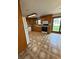 Eat-in kitchen featuring wood cabinets, sleek appliances, and sliding glass doors at 1011 N 10Th St, Elwood, IN 46036