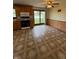 Eat-in kitchen featuring wood cabinets, sleek appliances, and sliding glass doors to the backyard at 1011 N 10Th St, Elwood, IN 46036