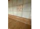 Close-up of kitchen backsplash with decorative accent tile and neutral countertop at 1011 N 10Th St, Elwood, IN 46036
