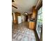 Eat-in kitchen featuring wood cabinets, sleek appliances, and sliding glass doors at 1011 N 10Th St, Elwood, IN 46036