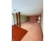 An empty living room space with carpet floors at 1011 N 10Th St, Elwood, IN 46036