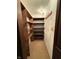Walk-in pantry with wooden shelving and coat hooks at 1011 N 10Th St, Elwood, IN 46036