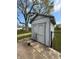Exterior shot of a gray backyard shed with double doors at 1011 N 10Th St, Elwood, IN 46036