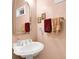 Bathroom sink with mirror and decor at 10390 Tremont Dr, Fishers, IN 46037