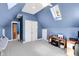 Bright bonus room features ample storage, natural light, and a comfortable workspace at 10390 Tremont Dr, Fishers, IN 46037
