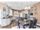 Kitchen with updated cabinets, eat in dining table, and stainless steel appliances at 10390 Tremont Dr, Fishers, IN 46037