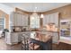 Charming kitchen with updated cabinets, granite countertops, and stainless steel appliances at 10390 Tremont Dr, Fishers, IN 46037