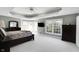 Spacious main bedroom featuring trey ceiling, bay window, and plenty of natural light at 10390 Tremont Dr, Fishers, IN 46037
