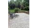 View of the patio with outdoor seating and a small seat wall at 10390 Tremont Dr, Fishers, IN 46037