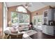 Sunroom featuring many windows and french doors at 10390 Tremont Dr, Fishers, IN 46037