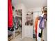 Well-organized walk-in closet with ample hanging space, shelving, and full length mirror at 10390 Tremont Dr, Fishers, IN 46037