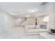 Spacious finished basement with new carpet, neutral paint, and stylish wainscotting at 1045 Millwood Ct, Indianapolis, IN 46260