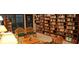 Community library featuring wooden bookshelves, reading chairs, and a cozy, quiet atmosphere at 1045 Millwood Ct, Indianapolis, IN 46260