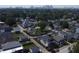 Aerial view of a neighborhood with a skyline in the distance, showcasing the community at 1048 St Peter St, Indianapolis, IN 46203