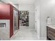 Bathroom with a walk-in shower, walk-in closet, and spacious vanity at 1048 St Peter St, Indianapolis, IN 46203
