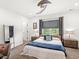 Inviting bedroom with plush carpet, elegant furnishings, and a calming atmosphere for restful nights at 1048 St Peter St, Indianapolis, IN 46203