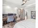 Bedroom with barn door leading to bathroom and view of upstairs hallway at 1048 St Peter St, Indianapolis, IN 46203