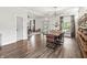 Spacious dining area featuring hardwood floors, natural light, and an open connection to the living spaces at 1048 St Peter St, Indianapolis, IN 46203