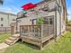 Beautiful two-story home with multiple decks, comfortable seating, and stylish exterior design at 1048 St Peter St, Indianapolis, IN 46203